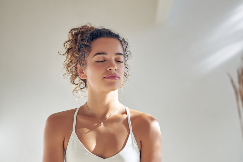woman meditating in Toronto