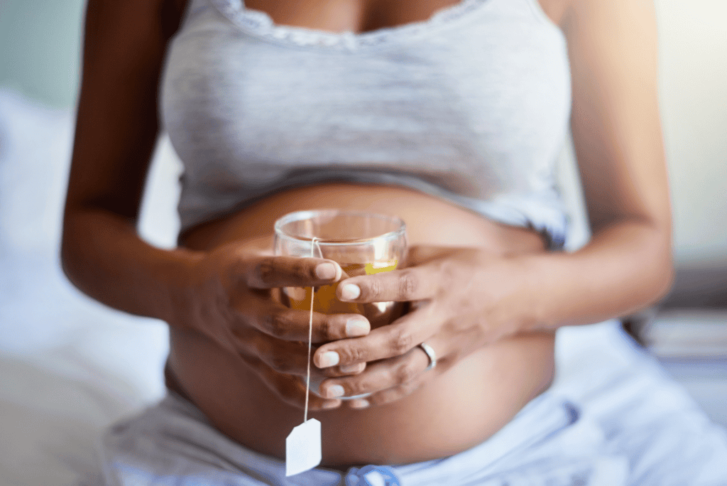 pregnant woman enjoying tea at a Toronto wellness clinic